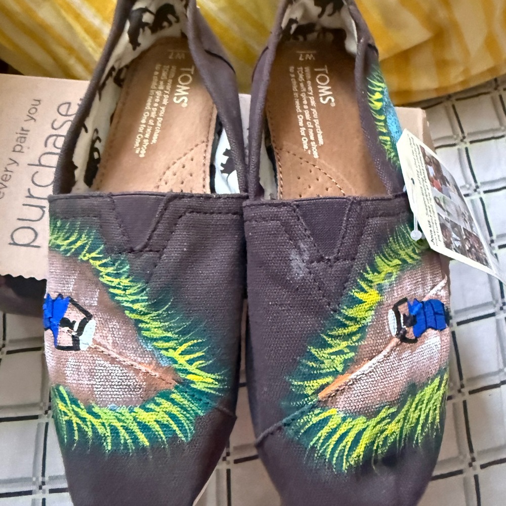 TOMS Brown Canvas Slip-Ons with Artistic Design